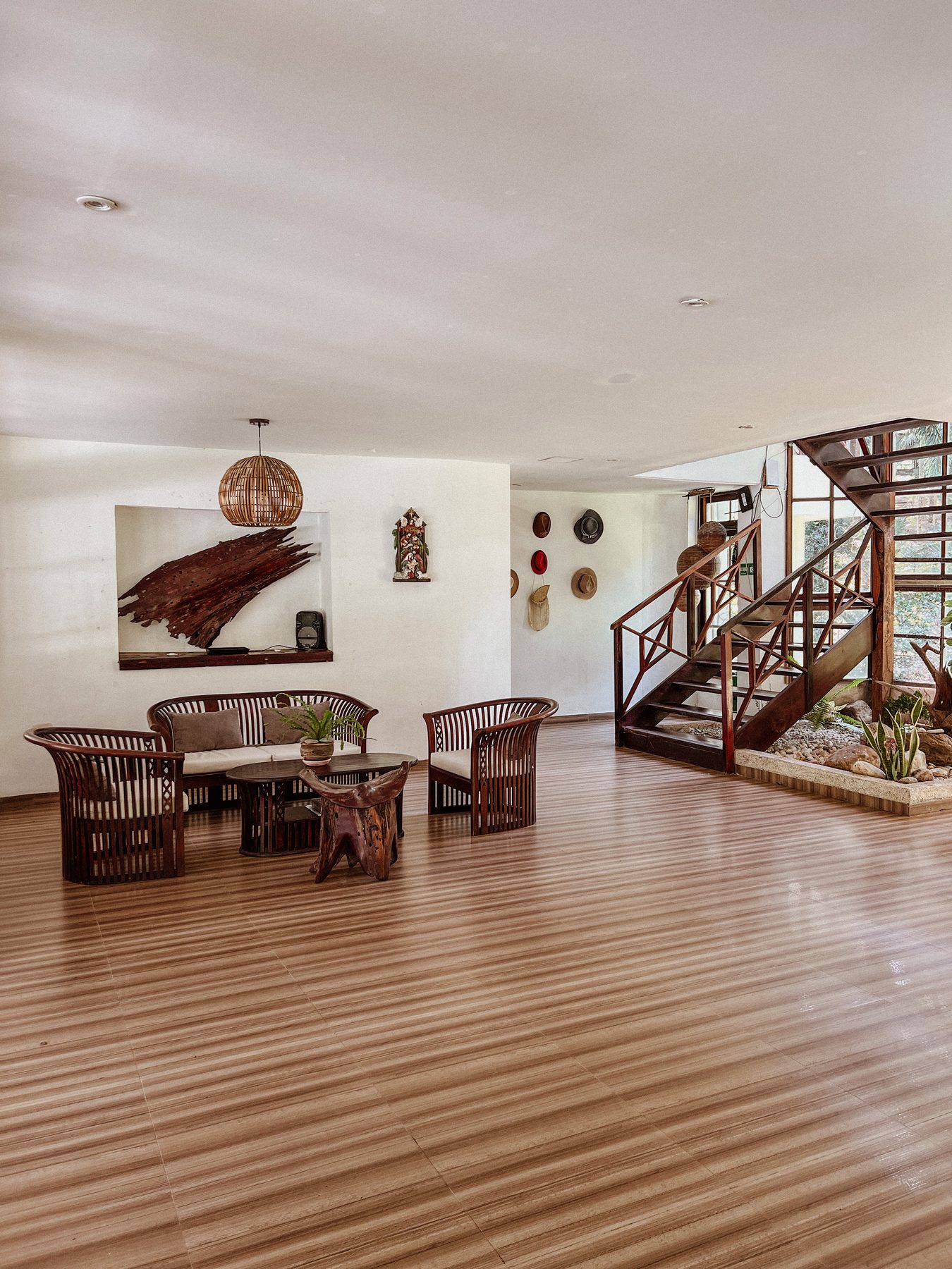 Main living hall with artisan spiral staircase