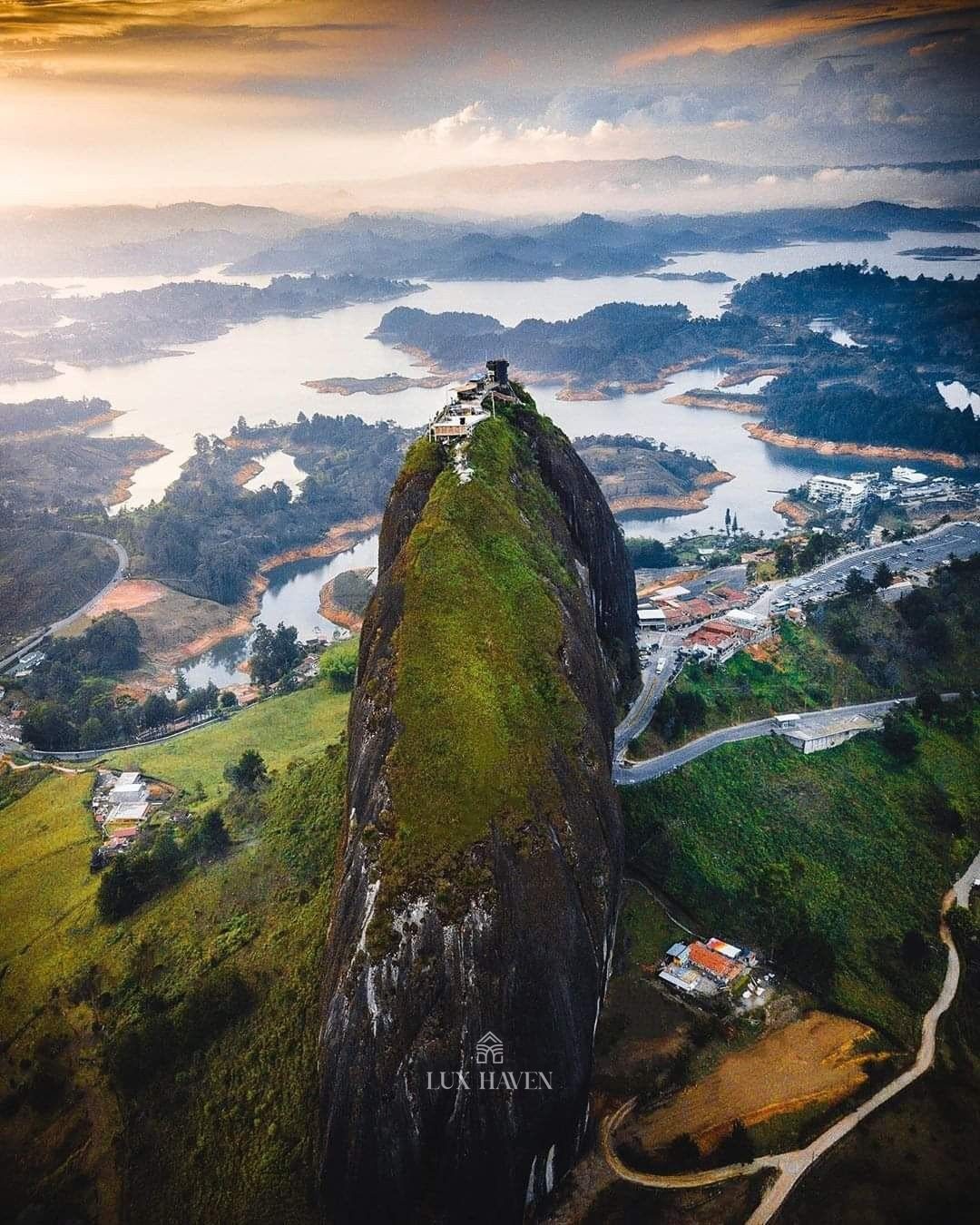 The Piedra del Peñol at sunrise above the lake, two kilometres from the development