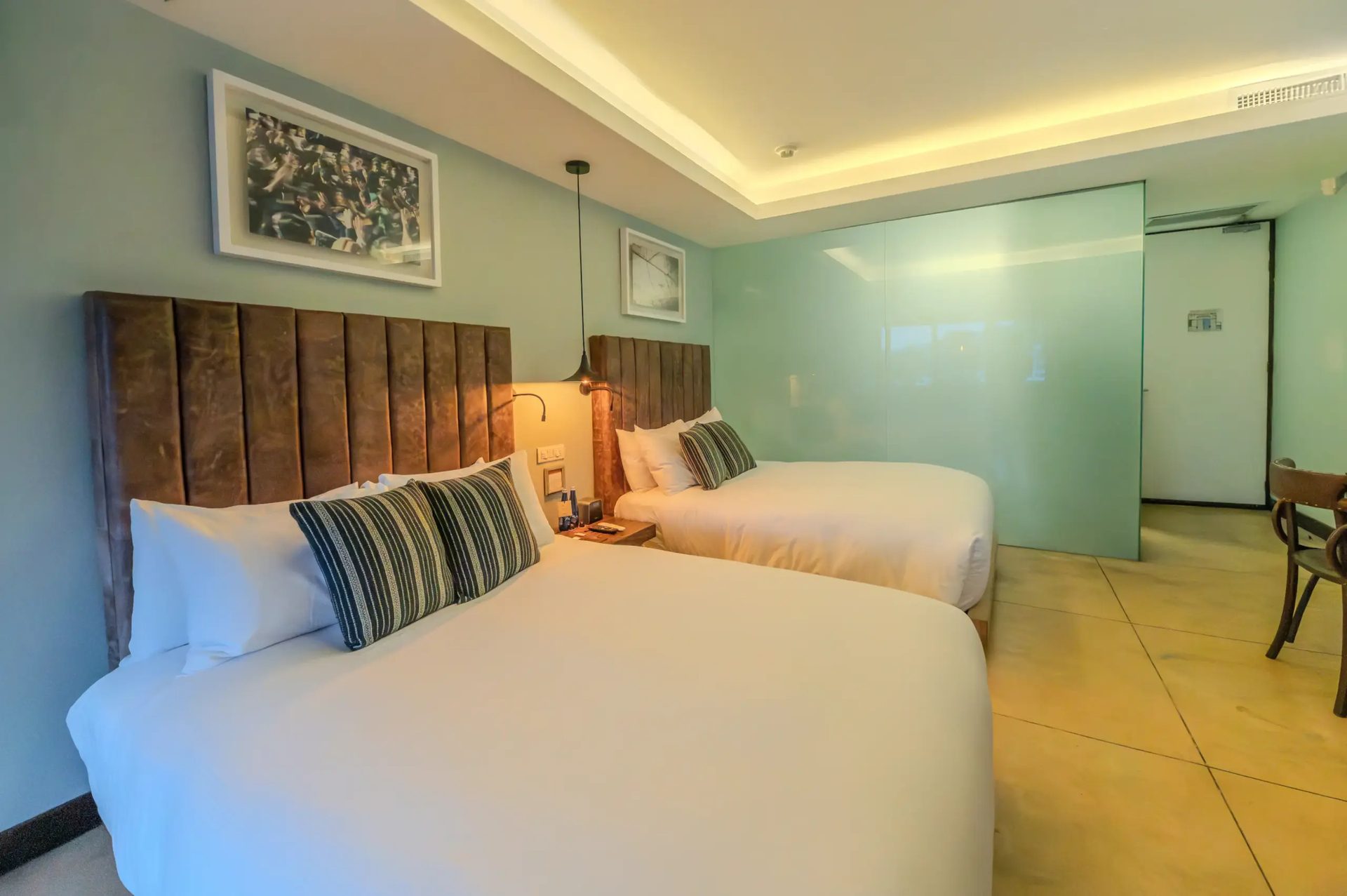 Chambre dans le style signature de l'hôtel